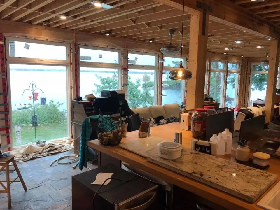 Pendant and recessed lights installed during a lake house renovation.