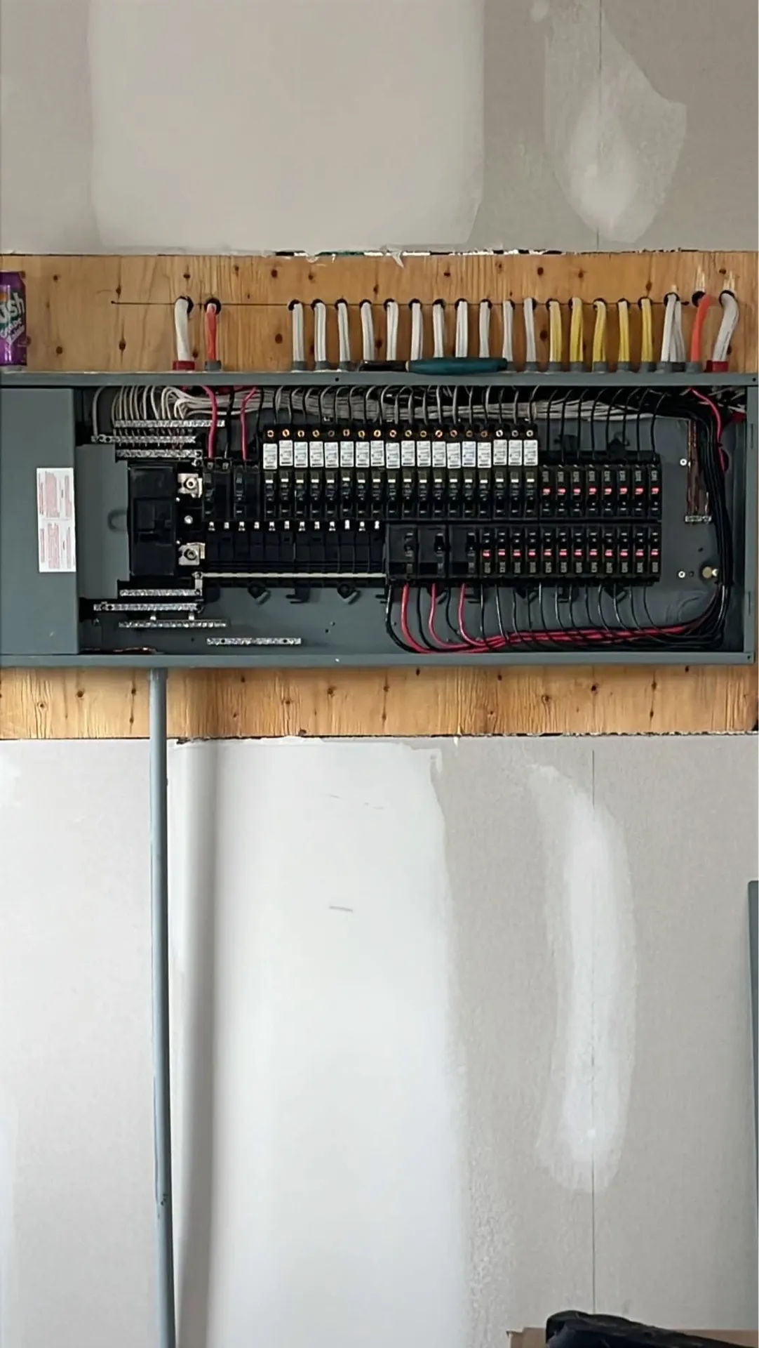 Completed residential breaker panel with labeled branch circuits.